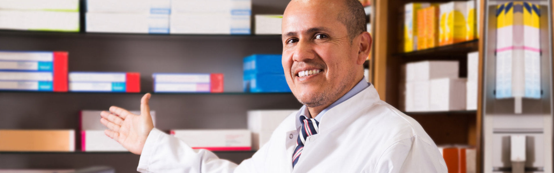 Pharmacist showing medicines